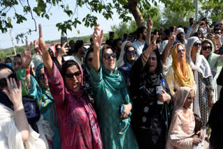 Supporters of imprisoned former Pak PM Imran Khan's celebrate after a court overturned the conviction and seven-year prison sentence of Khan and his wife in Islamabad on July 13, 2024.