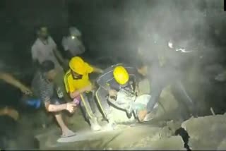 Three people were rescued and a few others are feared trapped under debris after a building collapsed on Tuesday at Helang near Uttarakhand's subsidence-hit Joshimath in Chamoli district, officials said.