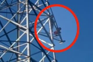 Man climbs high-tension electricity pole along with son after wife leaves with lover