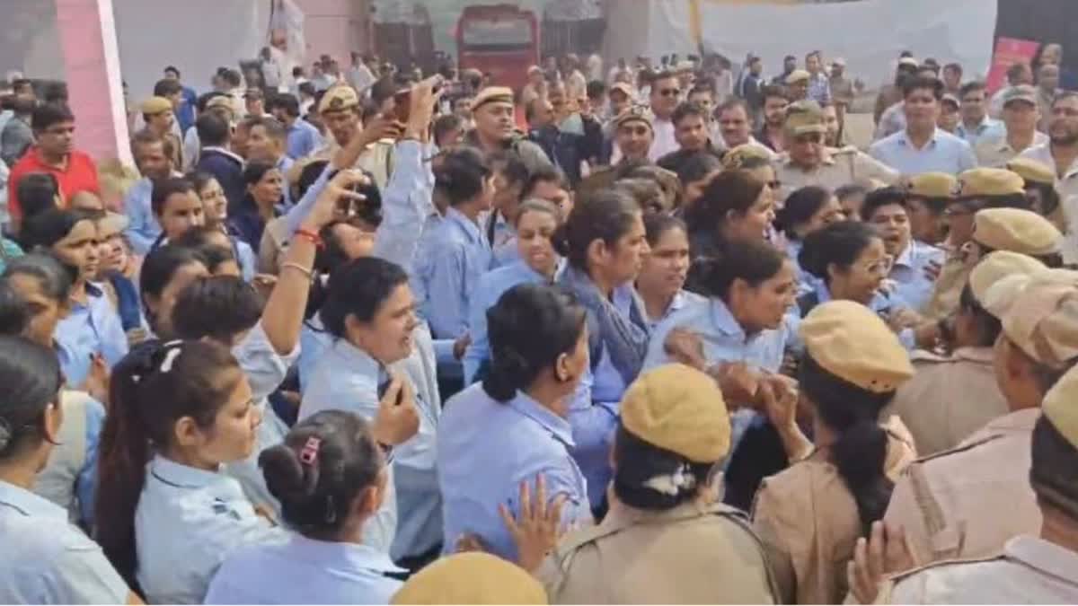 Protesters at the newly launched all-women bus depot at Delhi's Sarojini Nagar.