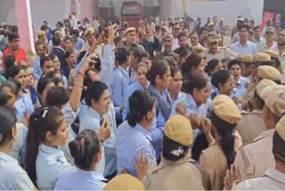 Protesters at the newly launched all-women bus depot at Delhi's Sarojini Nagar.