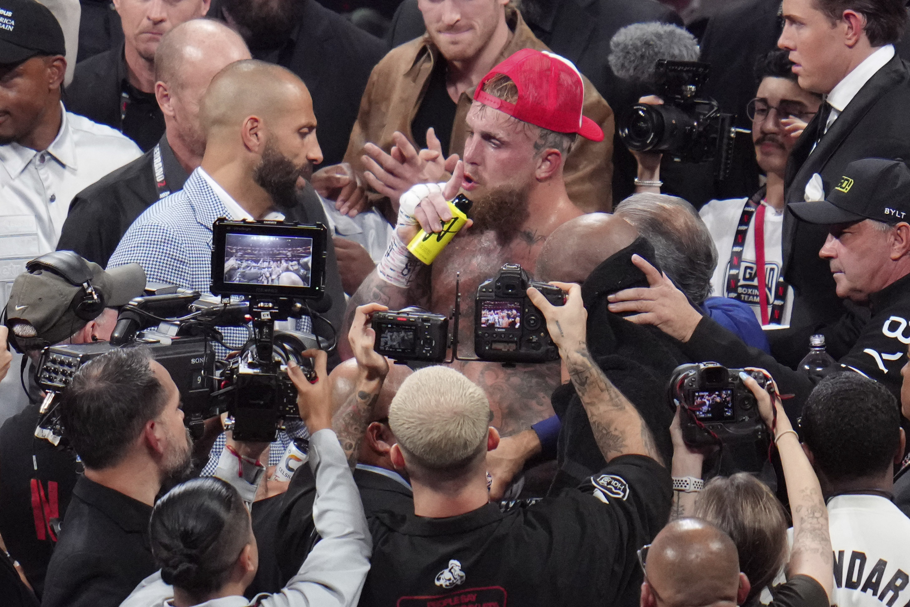 Jake Paul reacts after defeating Mike Tyson during their heavyweight boxing match, Friday, Nov. 15, 2024, in Arlington, Texas.