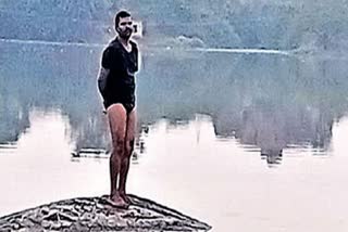 Hyderabad Thief On Rock In Lake