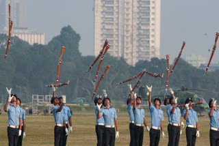 Indian Air Force personnel perform a drill during 'Military Tattoo' practice event ahead of the Vijay Diwas celebrations to commemorate the 53rd Vijay Diwas in Kolkata, West Bengal, Saturday, Dec 14, 2024.