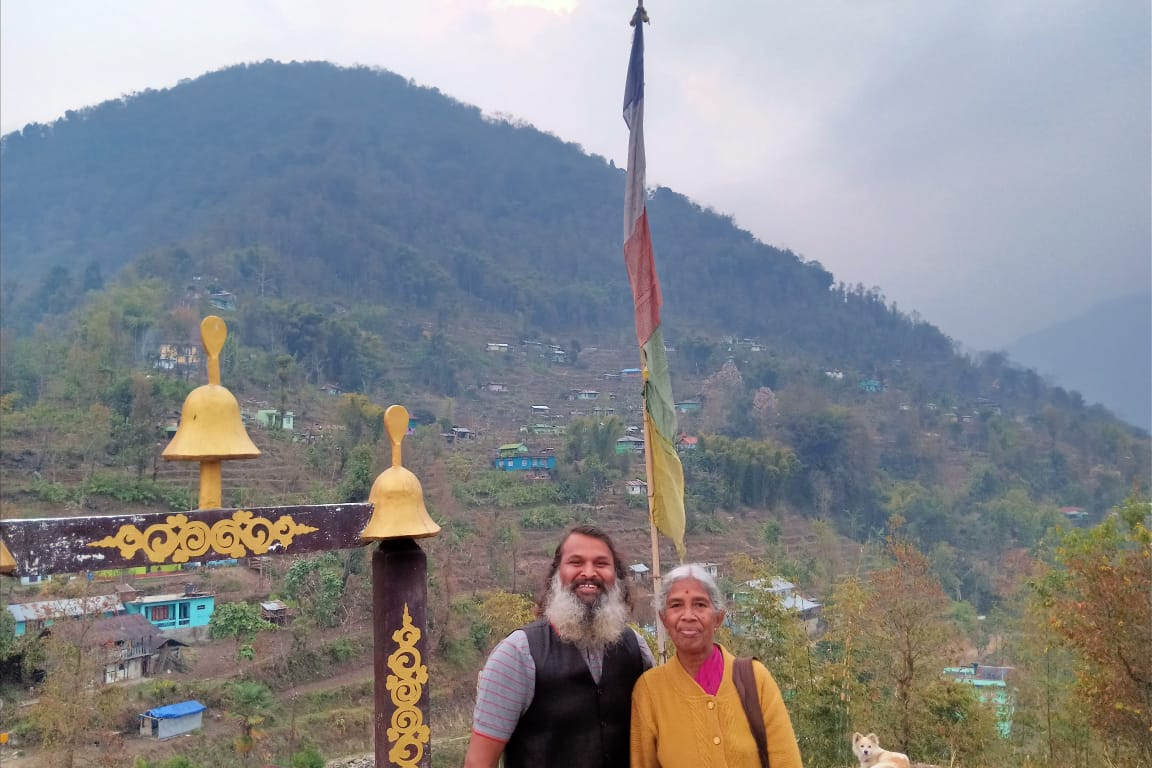 Man takes mother on pilgrimage on old  Scooter