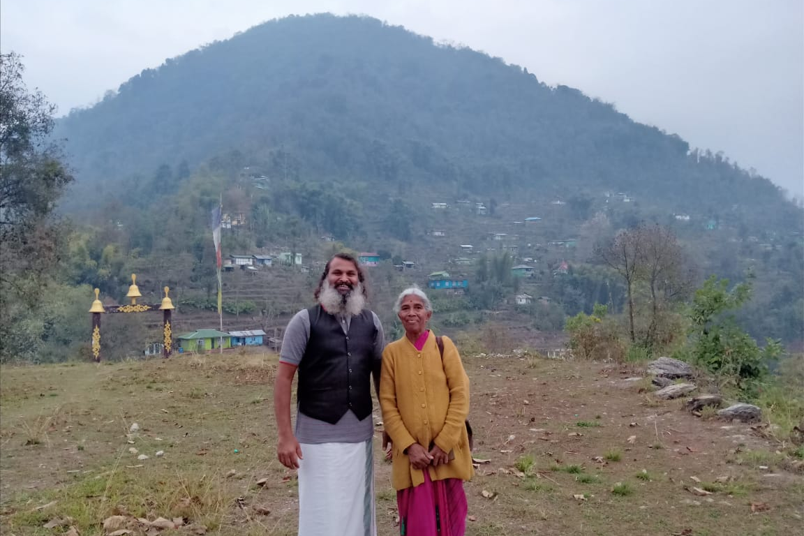 Man takes mother on pilgrimage on old  Scooter