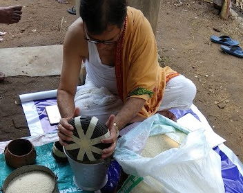 male family Members of Nalikul Singha Bari perform all rituals during Durga Puja