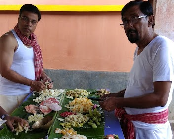 male family Members of Nalikul Singha Bari perform all rituals during Durga Puja