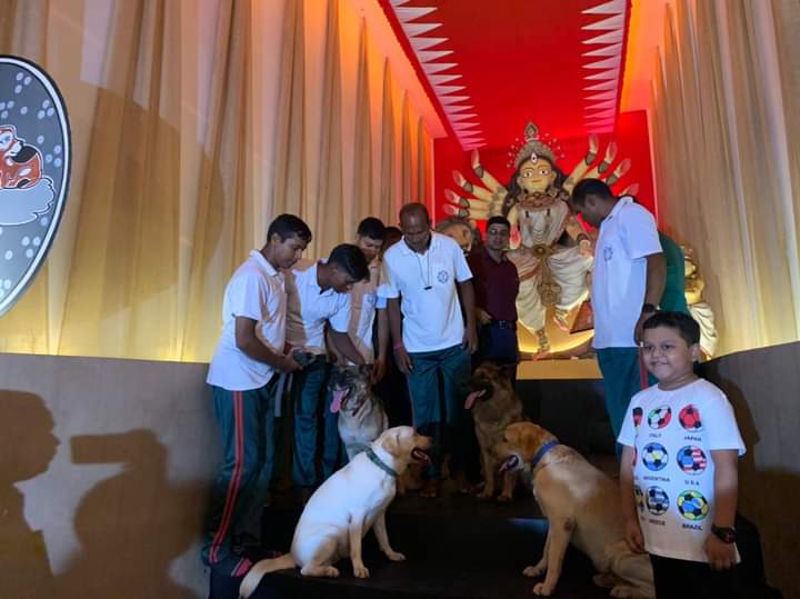 Members of Kolkata police dog squad visit Durga puja pandal in Kolkata