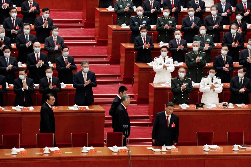 चीनी कम्युनिस्ट पार्टी का अधिवेशन दौरान मौजूद सदस्य.