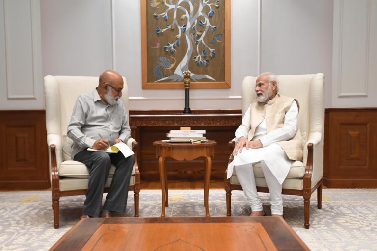 Eenadu MD talking to PM Narendra Modi