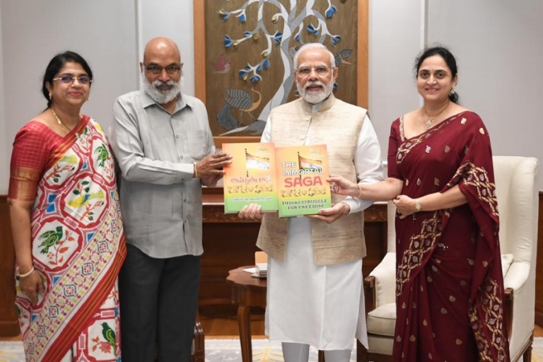 Presenting the book to PM Narendra Modi, along with the MD of Eenadu is Chi. Shailja and Ch. Vijayeshwari.