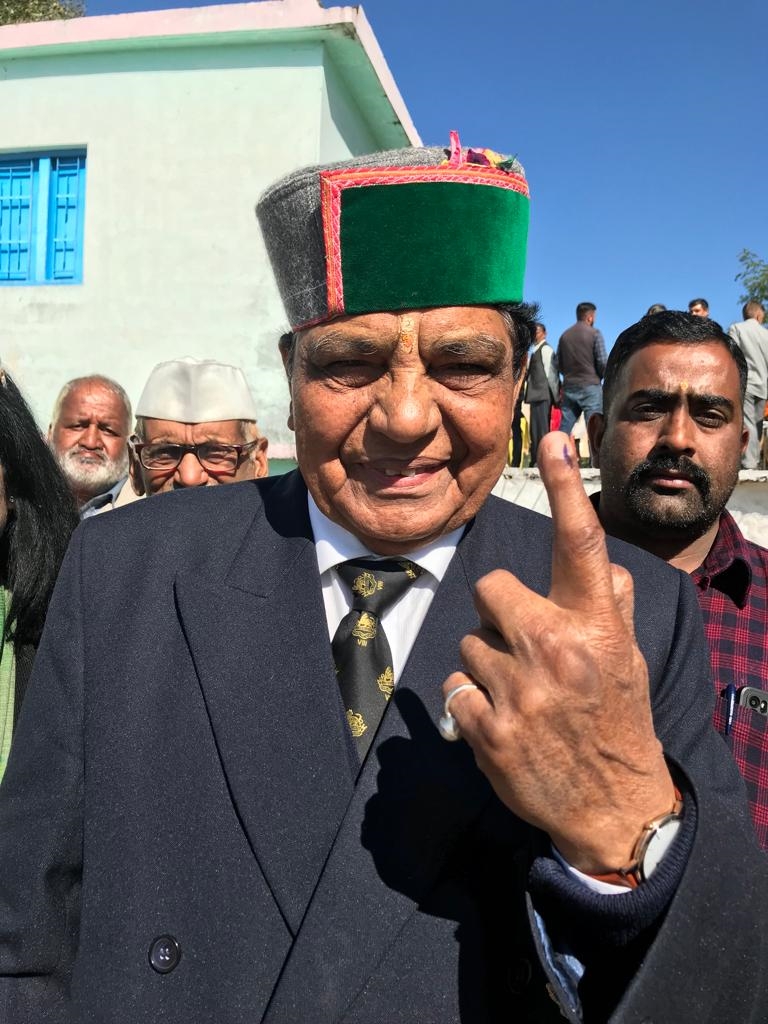 Congress candidate Dhaniram Shandil casts his vote