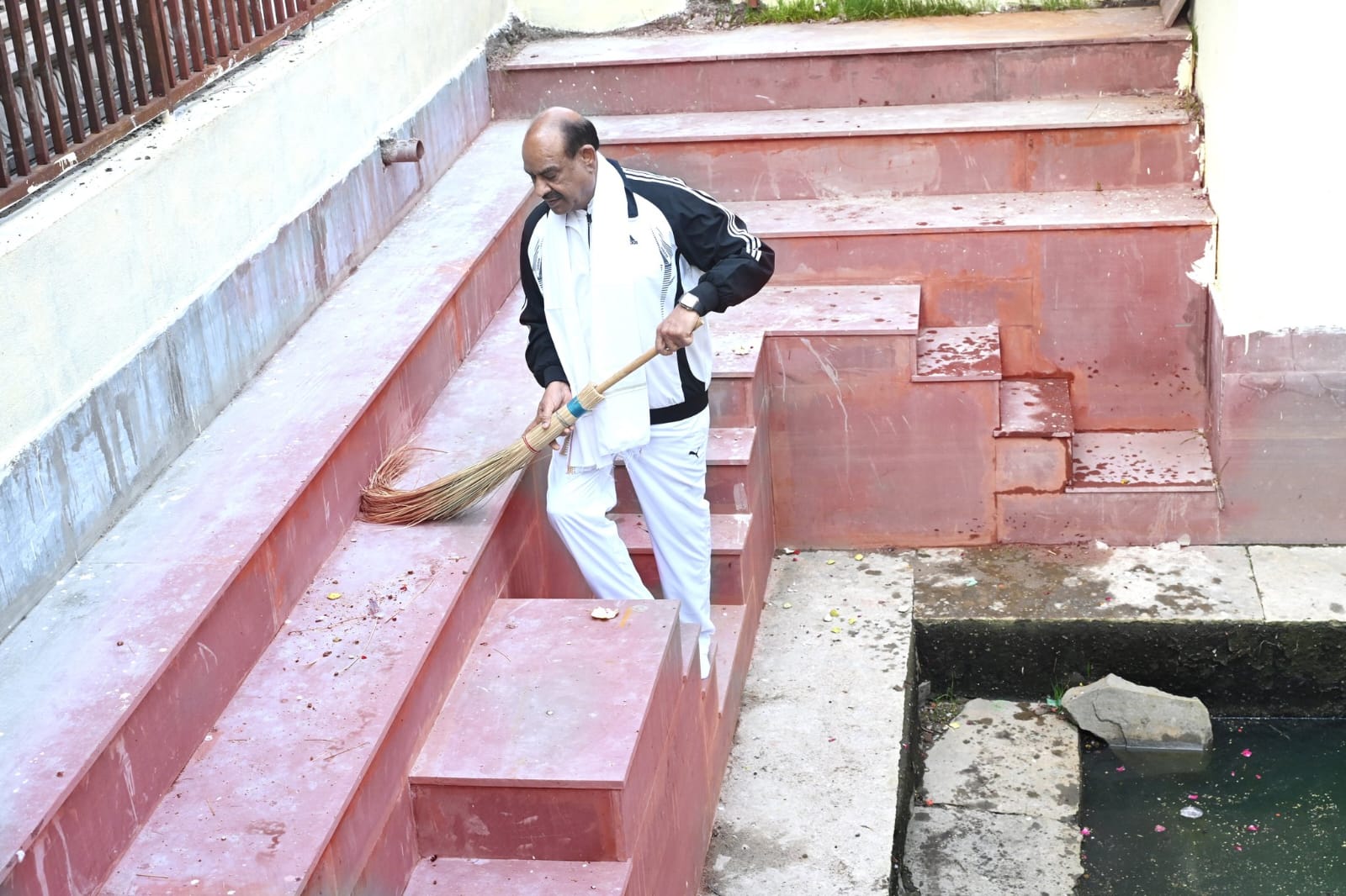 Om Birla cleaned the temple