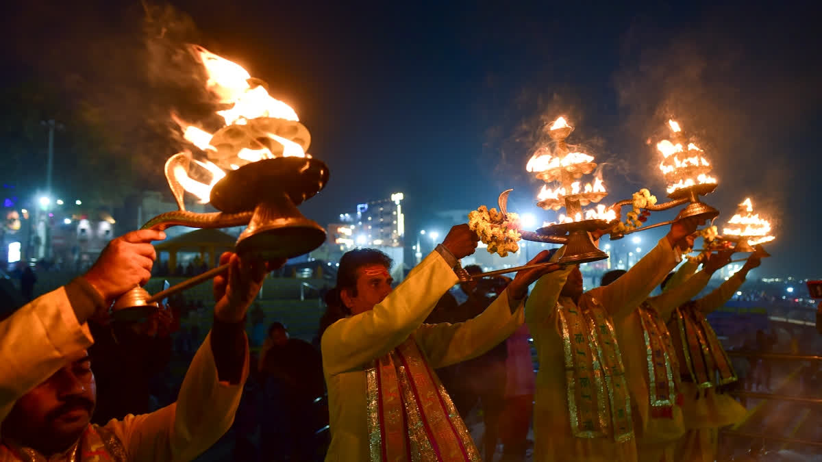 Priests perform Ganga Aarti during the ongoing Maha Kumbh Mela festival, in Prayagraj, Uttar Pradesh, Thursday, Jan. 16, 2025.