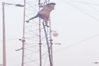 woman physiotherapist climbed tower