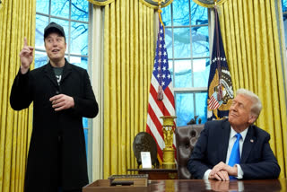 President Donald Trump listens as Elon Musk speaks in the Oval Office at the White House Feb 11 2025 in Washington