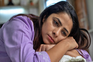 Tired looking woman