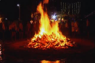DEVOTEES THROW FIRE AT PEOPLE