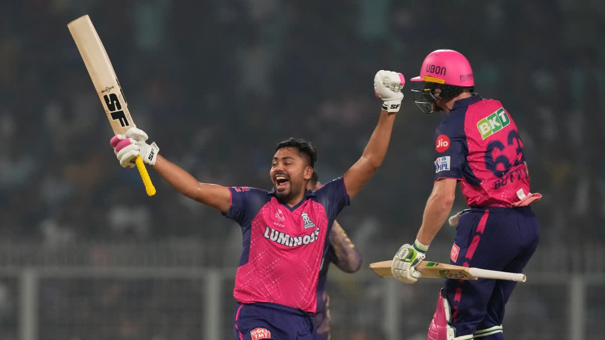 Rajasthan Royals' Jos Buttler and Avesh Khan celebrate their win against Kolkata Knight Riders during the Indian Premier League cricket match in Kolkata, India, Tuesday, April 16, 2024.