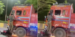 Bike rider narrowly escapes after colliding with truck