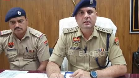 Gurugram ACP Crime Varun Dahiya (R) during a presser after the murder of a boy by her own mother in Gurugram