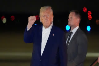 President Donald Trump gestures as he arrives on Air Force One, Friday, May 16, 2025, at Joint Base Andrews, Md