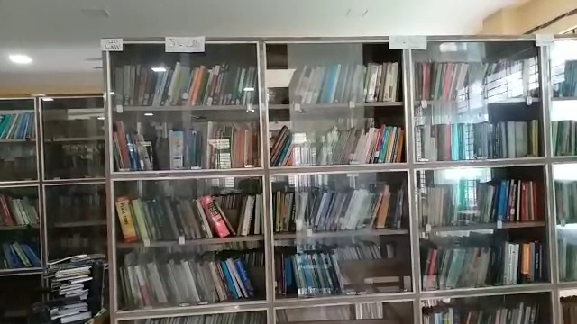 Students crowd at the Tezpur district library