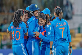 India's Radha Yadav and teammates celebrate the dismissal of Nondumiso Shangase during the 1st ODI match against South Africa Women at M. Chinnaswamy Stadium in Bengaluru on Sunday.