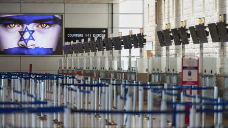 Israel's Ben Gurion Airport is empty of passengers following an Israeli military strike on Iran, in Lod, near Tel Aviv, Israel, Friday, June 13, 2025.