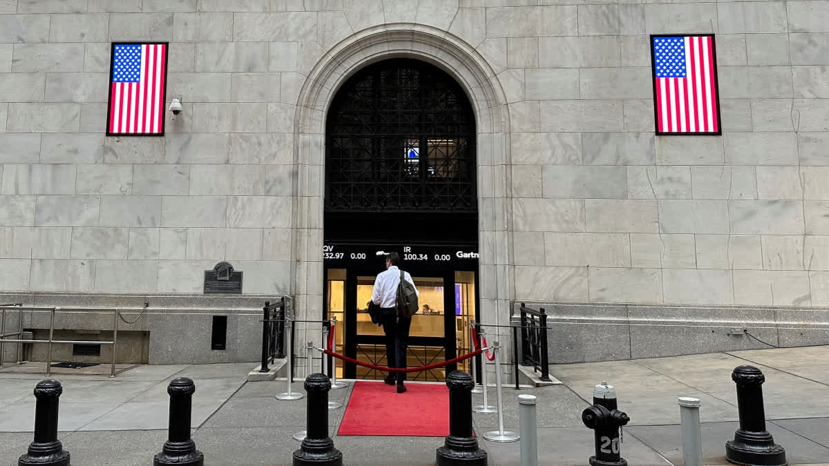 A man enters the New York Stock Exchange on Wednesday, July 17, 2024, in New York. Global stocks have mostly fallen, with shares in London declining after data showed the inflation rate remained steady at the Bank of England's 2% target in June.