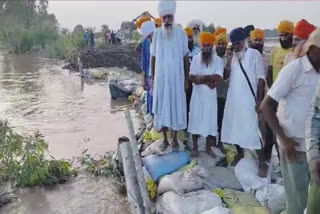 People dammed the river to stop the flood in Kapurthala