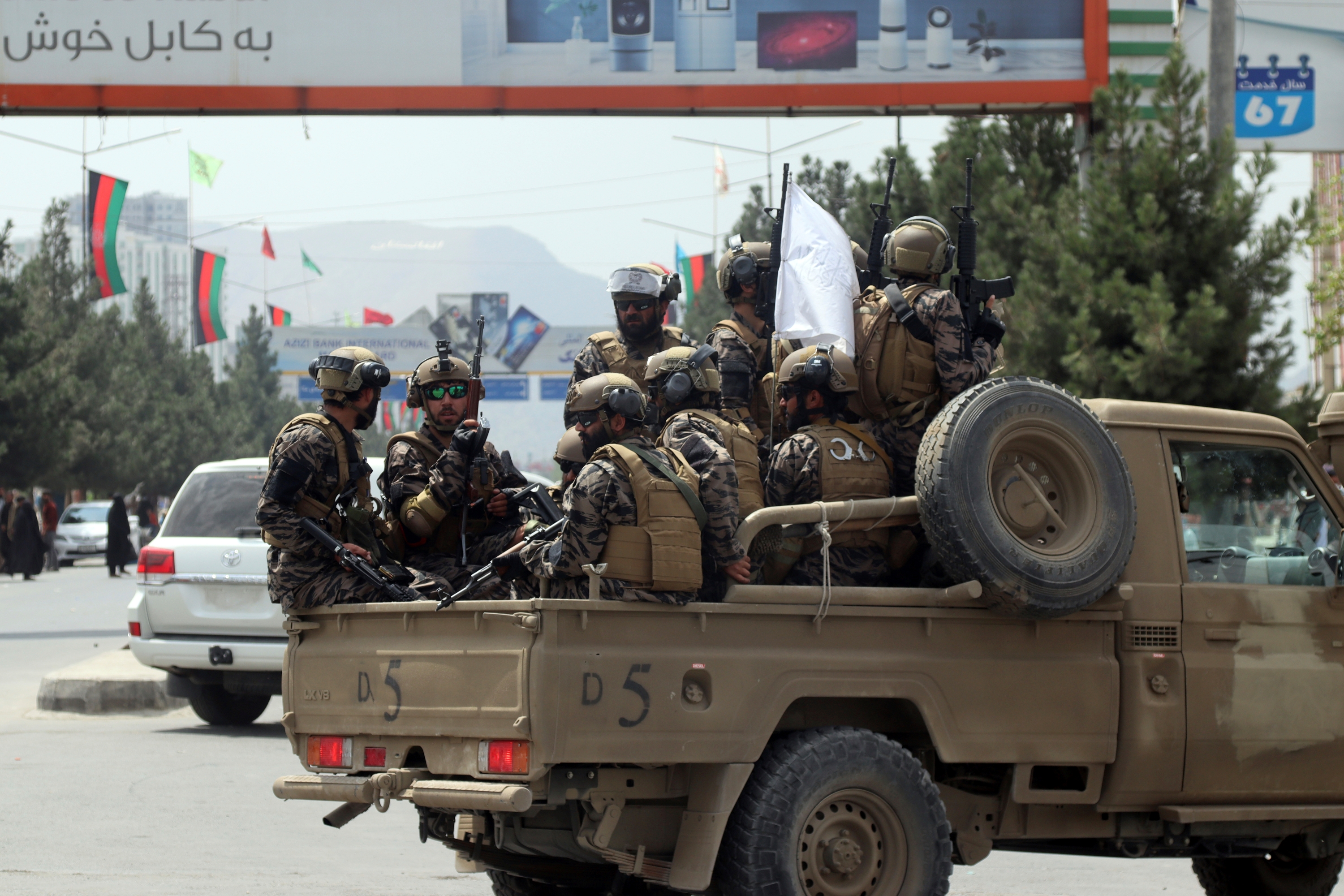 Taliban special force fighters arrive inside the Hamid Karzai International Airport after the U.S. military's withdrawal, in Kabul, Afghanistan, Aug. 31, 2021.