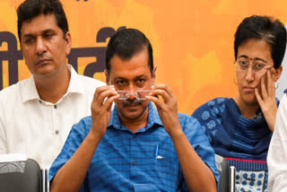 Delhi Chief Minister Arvind Kejriwal (centre) with ministers Saurabh Bharadwaj (left) and Atishi during AAP workers' meeting, in New Delhi, Sunday, Sept. 15, 2024.