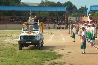 Minister Dr. Sharanprakash Patil received the flag salute in an open vehicle