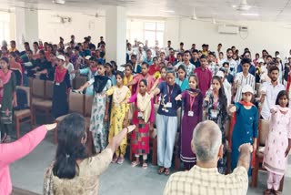 Students being administered oath to vote on the voting day of Haryana assembly election