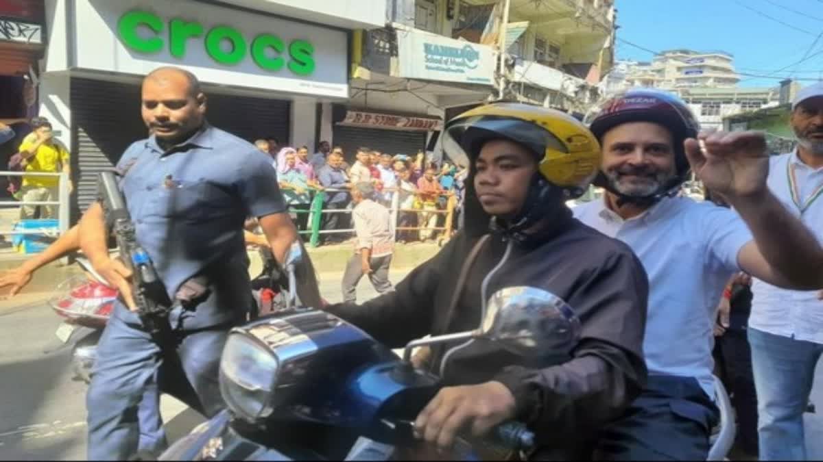 Rahul Gandhi rides pillion on scooter taxi in Aizawl, hails traffic discipline
