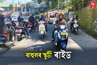 Rahul Gandhi rides pillion on scooter