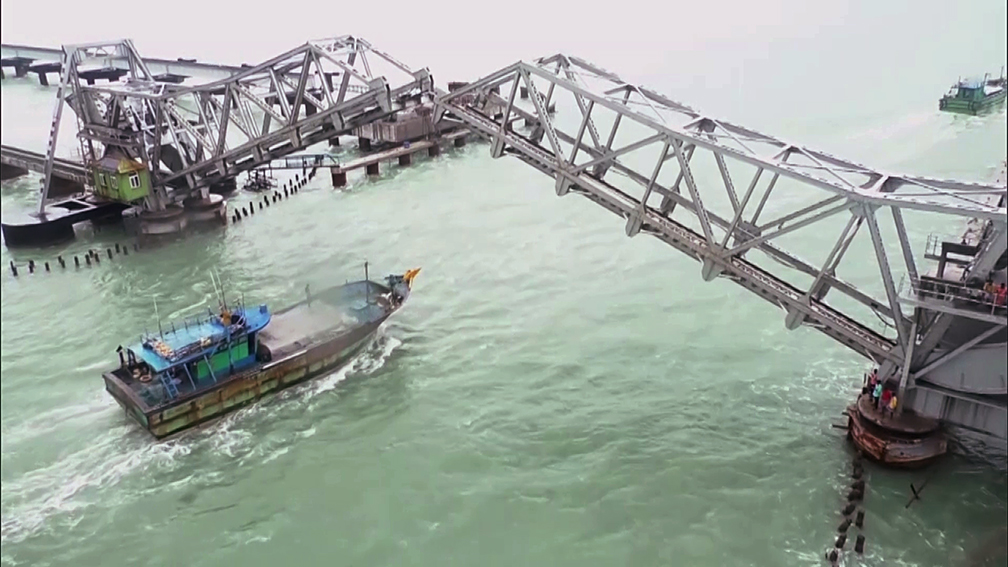 File - The suspension Railway Bridge in Pamban opens for fishing boats at Rameswaram, in Ramanathapuram in 2023.