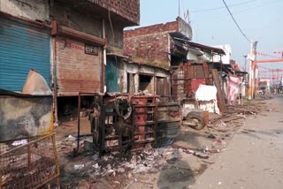 Charred remains outside the shop in Mahasi, Bahraich.