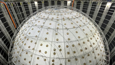 This photo taken during a media tour on October 11, 2024 shows the neutrino detector, a stainless steel and acrylic sphere around 35 metres in diameter, at the Jiangmen Underground Neutrino Observatory (Juno) in Kaiping, in southern China's Guangdong province.