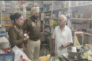 Two robbers looted cash from a shopkeeper at gun point in Sangrur