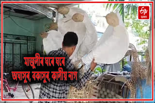 Mask artist busy in making Mukha for Raasleela in Majuli