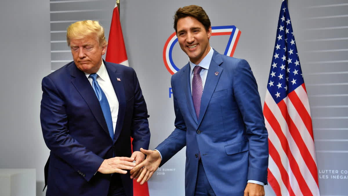 US President Donald Trump (L) and Canada's Prime Minister Justin Trudeau prepare to shake hands during a bilateral meeting at the Bellevue centre in Biarritz, south-west France on August 25, 2019, on the second day of the annual G7 Summit.