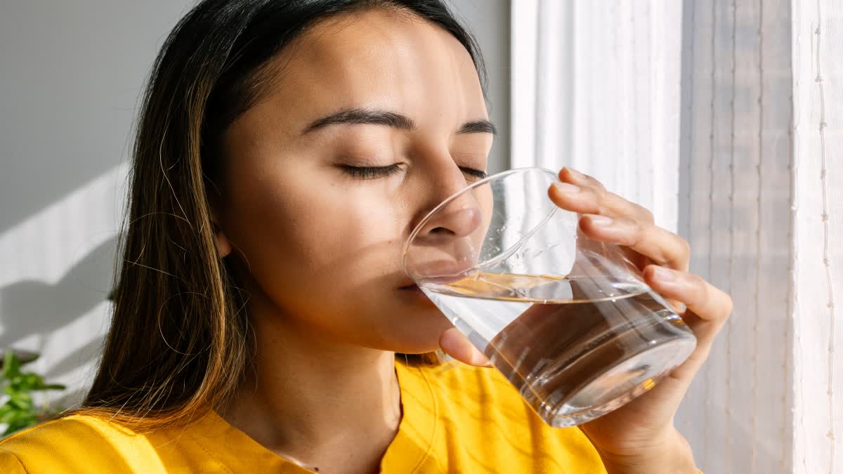 DRINKING WARM WATER IN THE MORNING