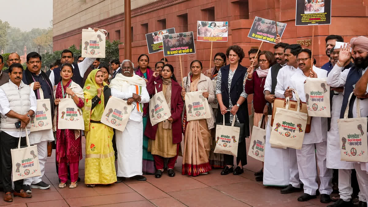 Congress leader Priyanka Gandhi Vadra with other opposition MPs takes part in a protest during ongoing Winter session of Parliament, in New Delhi, Tuesday, Dec. 17, 2024.