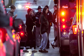 Students aboard a bus as they leave the shelter following a shooting at the Abundant Life Christian School, Monday, Dec. 16, 2024.