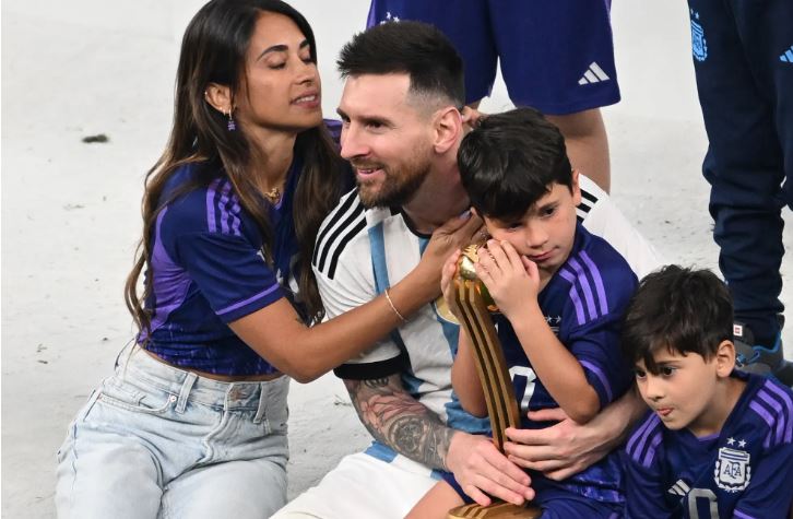 Lionel Messi celebrates his FIFA World Cup win with wife and sons