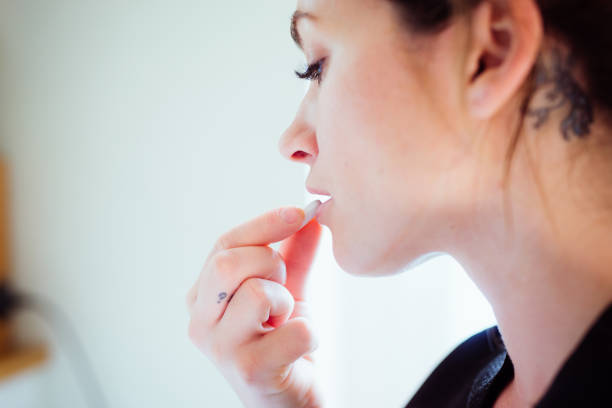 Woman Eating Antibiotics