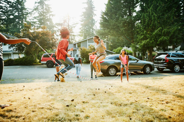 Two girls jumping rope